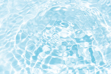 Blue water with ripples on the surface. Defocus blurred transparent blue colored clear calm water...