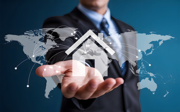 Businessman presenting global real estate concept with world map and modern home symbol