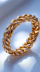 Obraz premium Luxurious Gold Rope Ring: A Close-Up