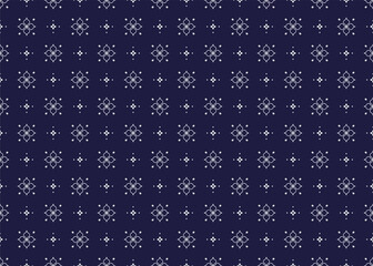Seamless white floral blooming on dark blue background, ethnic fabric seamless pattern, design for cloth, carpet, batik, wallpaper, wrapping etc. © Misterwrongtime