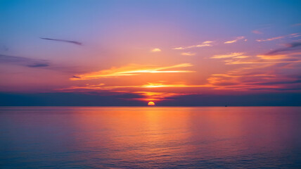 Naklejka premium Tranquil Sunset Over Serene Ocean Horizon
