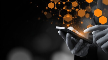 Person using a smartphone with glowing hexagonal network overlay on a dark background.