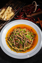 Spicy beef shreds made with ginger, green pepper, chili and beef shreds, Chinese food