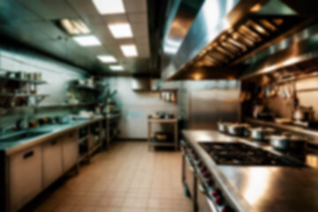 Interior of restaurant kitchen with professional utensils, out of focus, blurred