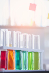 Vertical Horizon Science laboratory chemistry test science lab with microscope glass tubes on white table scientific background. Vertical Colorful Liquid biology scientist laboratory chemical fluid