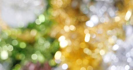 Blurred background golden glitter shiny sparkling banner. Happy Holidays background for template on christmas card brochures posters. Gold bokeh template for digital presentation slideshow background