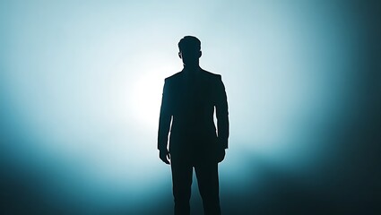 Fototapeta premium silhouette of a man in a suit