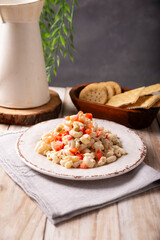 Macaroni salad with elbow pasta and canned tuna, served with saltine crackers. Easy and healthy recipe.