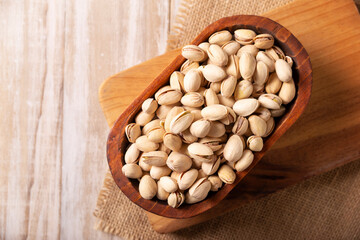 Pistachios in a bowl. Pistachios are the seeds of the Pistacia vera tree, a healthy food rich in antioxidants, vitamins, and minerals. They are consumed as a snack or as an ingredient in many recipes.