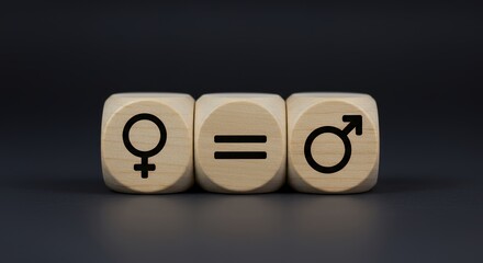 Gender Equality Symbolized by Wooden Cubes Displaying Male Female Symbols on Dark Gray Backdrop For Lgbt Pride Month Awareness and Community Support