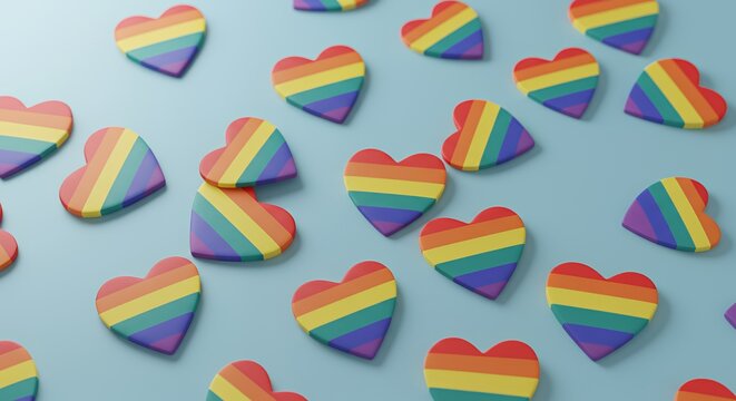 Scattered Rainbow Paper Hearts on Light Blue Surface Symbolizing LGBT Pride Celebration Love and Equality Artistically Rendered with Soft Lighting for Diverse Decoration