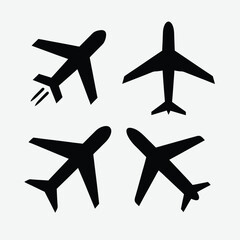 Four Simple Airplane Silhouettes Against a Light Background.