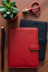 Red and black leather notebook with pen, a personal business accessory on paper