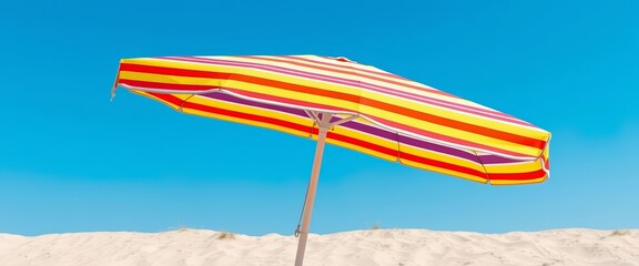 Vibrant striped beach umbrella on sandy beach under clear blue sky, rest, ocean