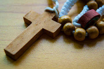 Top view of Holy Rosary with customizable space for Religion message or text.