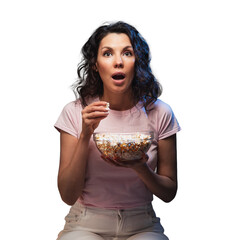 Young beautiful woman stay home, during pandemic, spends his free time watching TV on couch at home, wonder and scared. Girl watching projector movies with popcorn in evening