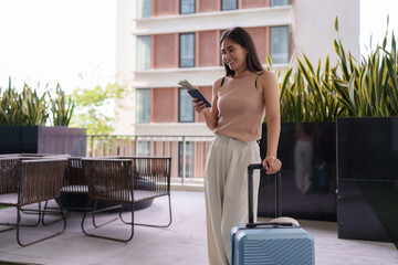 Tourist counting money and holding passport ready for summer vacation trip