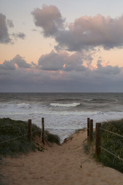 Access to a sandy beach among the dunes