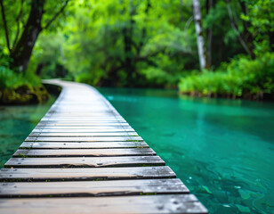 Fototapeta premium Serene wooden walkway over tranquil turquoise water, surrounded by lush greenery, inviting exploration and tranquility in nature