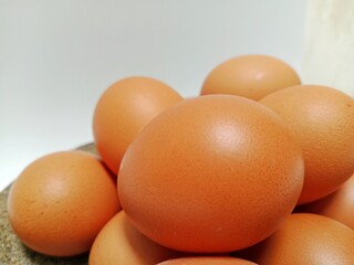 a pile of eggs with a white background