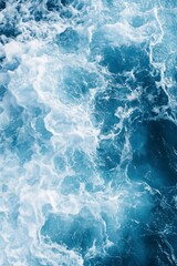 Obraz premium Serene Turquoise Ocean Waves with Bright White Foam Patterns