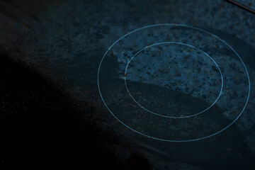 On a dark blue background, there is a circle positioned in the center