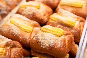 Close up of pastries topped with powdered sugar, visually appealing