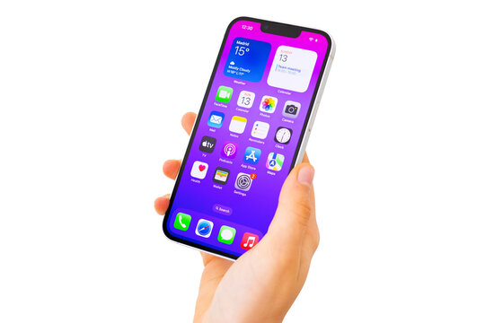 Madrid, Spain - April 13, 2025: The latest Apple iPhone 16e in hand on isolated background.