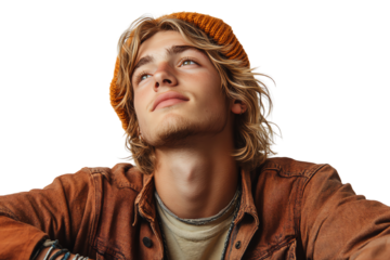 Young man with long hair, wearing an orange beanie, gazes thoughtfully upwards against a white isolated background.