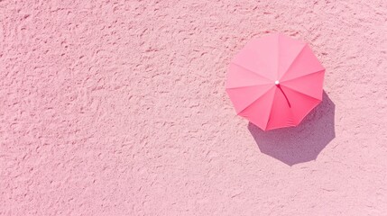 Pink Umbrella on Sand