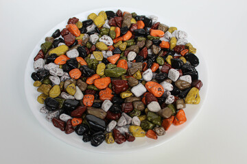 Turkish rocks chocolate on a plate, isolated in white background