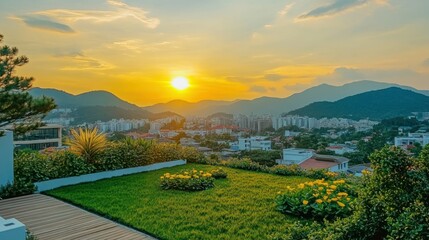 Obraz premium Sunset over urban landscape from rooftop garden
