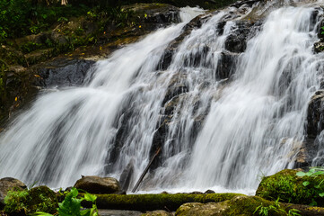 Beautiful Small Waterfall in summer Forest in jungle at Doi Saket Distric, Chiang Mai, Thailand