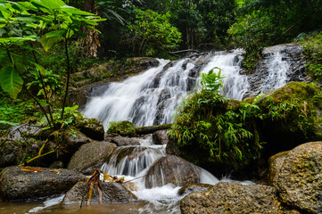 Beautiful Small Waterfall in summer Forest in jungle at Doi Saket Distric, Chiang Mai, Thailand