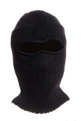 A black knitted balaclava with a single eye hole isolated on white. Black ribbed balaclava with an oval eye opening