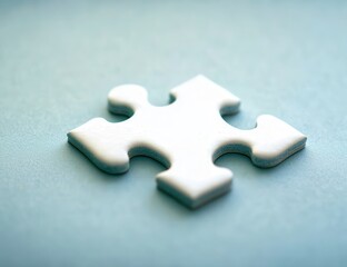 Single white puzzle piece on a light blue surface