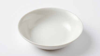A simple, elegant, off-white ceramic bowl on a white background