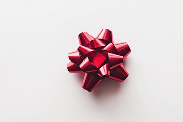 Red gift bow on white background