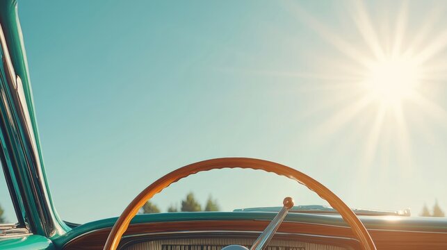 A vintage car's interior with a sunroof and steering wheel.
