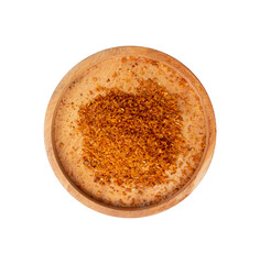 top view of chili powder in a wooden bowl
