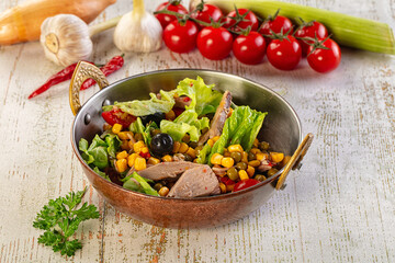 Dietary salad with canned tuna and corn