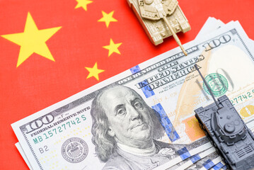Trade war, reciprocal tariffs, economic deal and military symbolism : U.S. dollars, tanks on a Chinese flag, representing geopolitical tensions, the strategic influence of military and economic power.