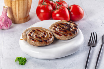 Grilled beef round circle sausages