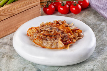 Fried crispy pork bacon snack