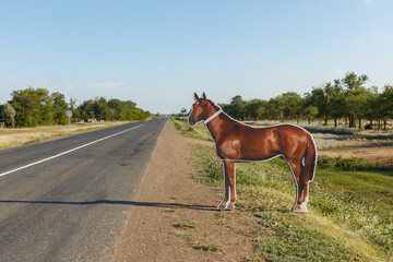 Horse mannequin placed on roadside for safety in Kazakhstan