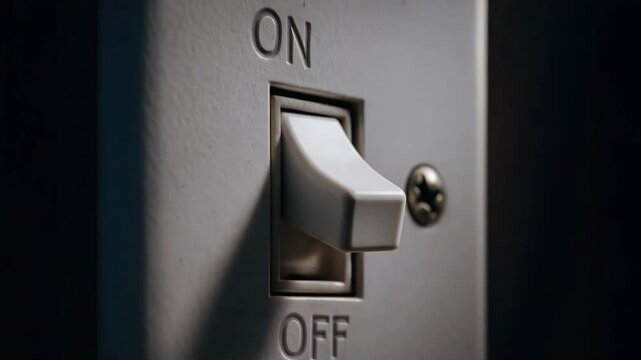 Light switch on wall with power control and electrical termination toggle in close up view for efficient home lighting management