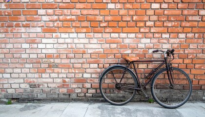Obraz premium Vintage bicycle against brick wall urban setting photography indoor environment side view classic transportation concept