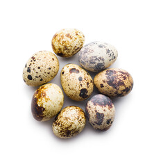 Obraz premium Spotted quail eggs isolated on white background.