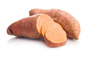 Raw sweet potatoes isolated on white background..