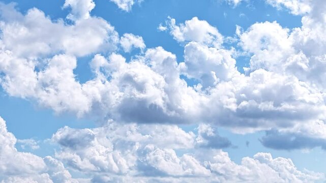 White fluffy clouds forming and swimming across endless sky, time lapse view